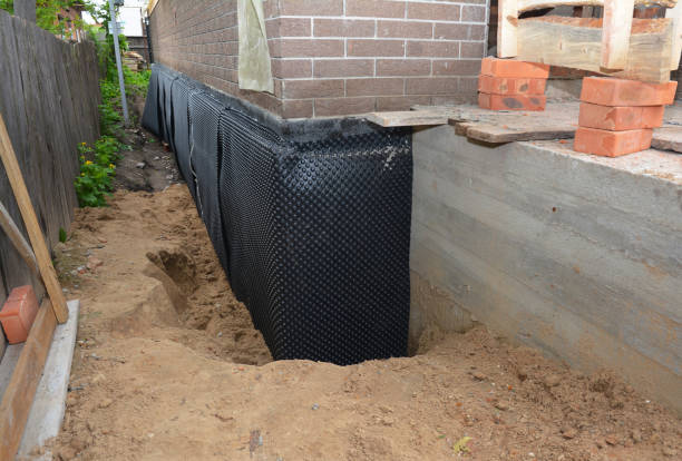 Happy homeowners after waterproofing job in Snellville